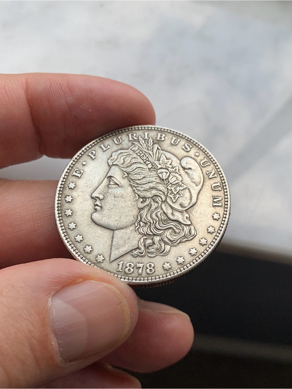 1879 Morgan silver dollar